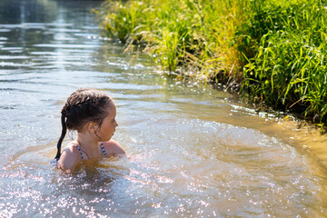 Fototapeta premium little girl bathing