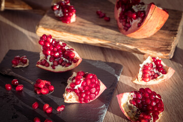 juicy pomegranate. Natural appearance in the kitchen, pieces of fruit healthy and full of vitamins