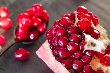 juicy pomegranate. Natural appearance in the kitchen, pieces of fruit healthy and full of vitamins