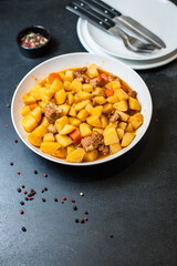 potatoe stewed goulash and meat roast second course vegetables portion on the table healthy meal snack outdoor top view copy space for text food background rustic image