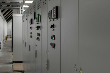 Close-up switch. Voltage distributor with circuit breakers. Electric background. Power supply of an industrial facility. Electricity supply.