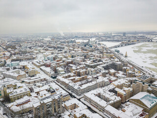 Obraz premium Snowy Kiev. Aerial drone view. Winter snowy morning.