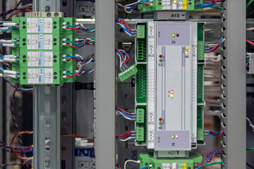 Automatic control systems close-up. Components and Controls for Process Control and Industrial Automation Solutions Fiber Optic Networking Equipment. Production automation. Long distance data and comm