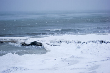 Frozen icy sea and winter beach