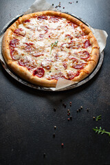 pizza pepperoni or salami meat sausage and double cheese fast food Takeaway ready to eat on the table meal snack outdoor top view copy space for text food background rustic image