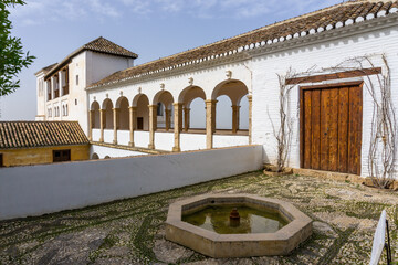 Fototapeta premium view of the Generalife Palace and grounds in the Alhambra Palace complex above Granada