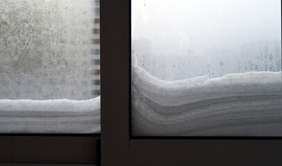 Winter. Frost. Snowfall. The snow lay in beautiful layers on the glass of the window on the street side. The windows were fogged with cold.

