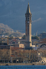 Panorama con il campanile San Nicolò che domina la città di Lecco - 413908253