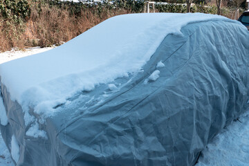 Covered car because of snow and ice