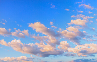 Beautiful picturesque dramatic sky at sunset  with pink clouds and beautiful  lighting.