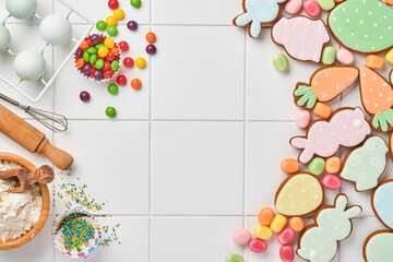 Easter baking background. Concept of cooking traditional festive food Easter gingerbread and bread on white background. Spring cooking time. Space for a text.