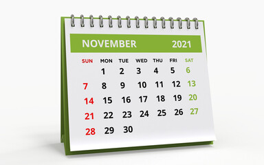 Standing Desk Calendar November 2021 green. Business monthly calendar with metal spiral-bound, the week starts on Sunday. Monthly Pages on a white base and green title, isolated on a white background