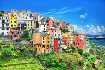 Fototapeta na wymiar Beautiful view of Corniglia .Is one of five famous colorful villages of Cinque Terre National Park in Italy, suspended between sea and land on sheer cliffs. Liguria region of Italy,Europe