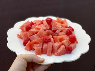 chopped pink pineapple and raspberries