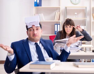 Employee with virtual reality glasses in office