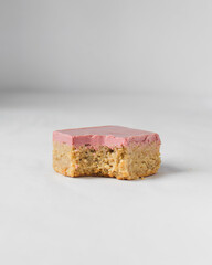 Homemade chewy flapjacks with a ruby chocolate coating, Oatmeal bars with chocolate layer