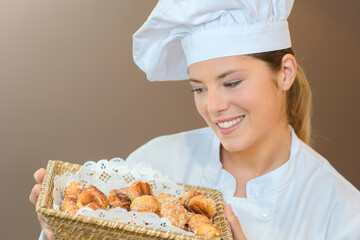 chef with a basketful of pastry