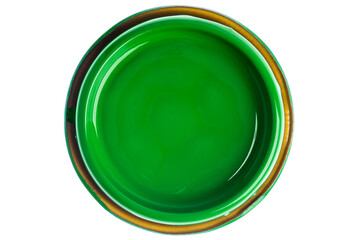 Lid of green can paint directly above isolated on white background