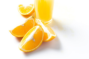 fresh, juicy sliced orange on a light background