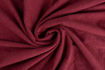 Crumpled linen cloth texture. Wrinkled textile. Red