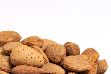 closeup of almonds on a white background