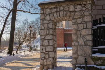 urban winter landscape Poland Krakow, old stone arch