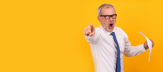 furious businessman pointing isolated on background