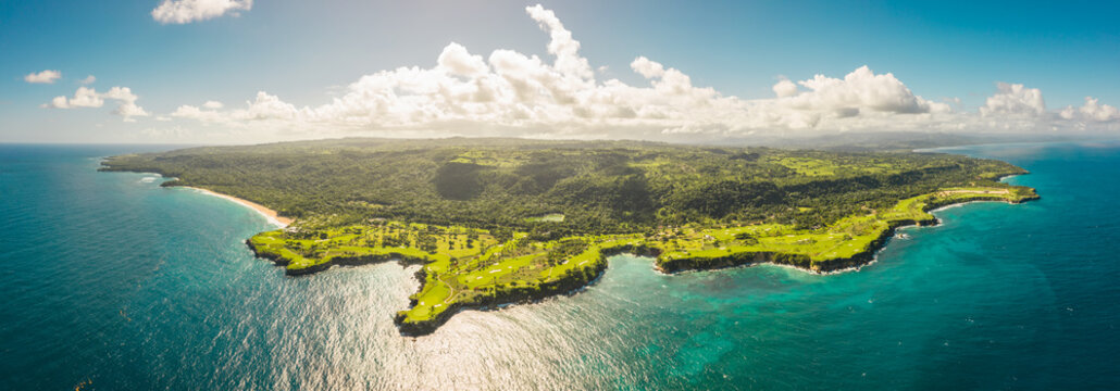Panoramic aerial view of a paradise island in the Atlantic Ocean at sunset. Playa grande beach near Rio San Juan, Mar&iacute;a Trinidad S&aacute;nchez, Dominican Republic.