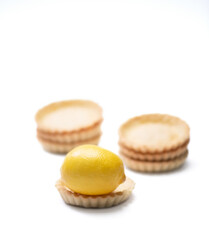 Stacked traditional french tart with lemons on top