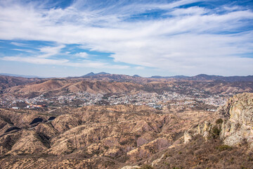 Fototapeta na wymiar Panoramic Aerial view of Guanajuato, Mexico surrounded by mountains.
