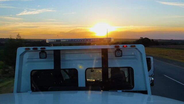 Pov drive on safari vehicle truck towards beautiful sunset in wilderness. South Africa Tour.