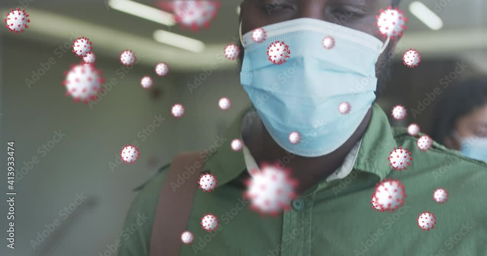 Poster animation of covid-19 cells floating with man having temperature checked wearing face masks