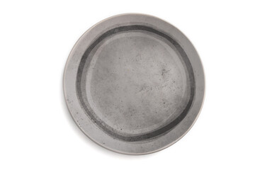 Empty gray ceramic plate isolated on white background. Top view, close up.