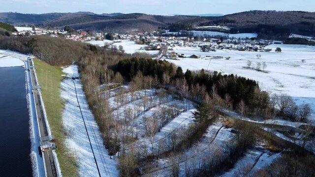 Flight over Lake Bostalsee in Germany on a winters day - aerial view