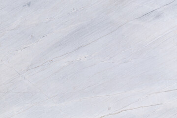 The surface of natural stone beige and white shades. White Carara marble texture background.