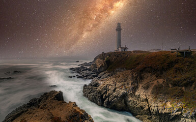 Pigeon Point Lighthouse against the backdrop of the beautiful sky and ocean with long exposure waves, a great landscape of the Pacific coast in California