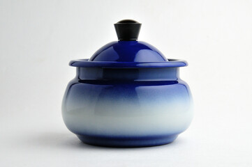 Blue sugar bowl on white background