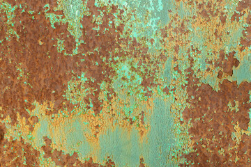 due to rust, most of the paint has peeled off the wall