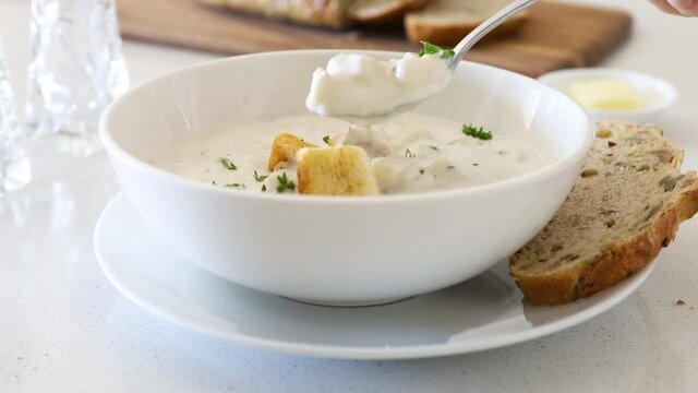 Eating a Bowl of Clam Chowder