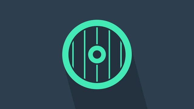 Turquoise Greek shield with greek ornament icon isolated on blue background. 4K Video motion graphic animation.