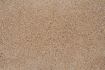 Fototapeta na wymiar Background from decorative plaster, fine sand, texture rough surface close-up
