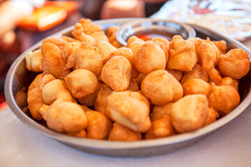 Tasty Donuts in the Plate . Delicious high-calorie food