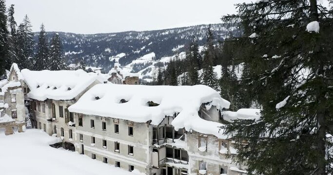 Desolated and ruined Grand Hotel Wildbad in San Candido, Italy, aerial view