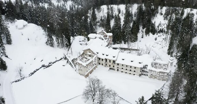 Aerial view of abandoned luxury spa in San Candido, Italy on winter day