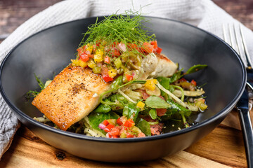 Grilled barramundi with fennel, pink grapefruit, pea tendrils and salsa verde