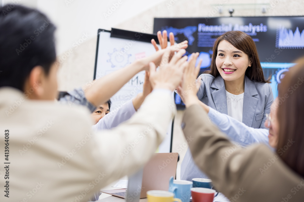 Wall mural coworkers discuss at table