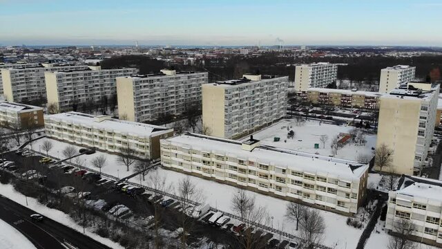 Drone flying sideways in Rosengård center. Wintertime in Malmö, Sweden