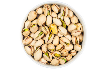 Pistachios in white porcelain bowls. Isolated food photo close up from above on white background