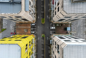 Top down aerial view of shop lot building
