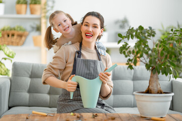 Family caring for plants.